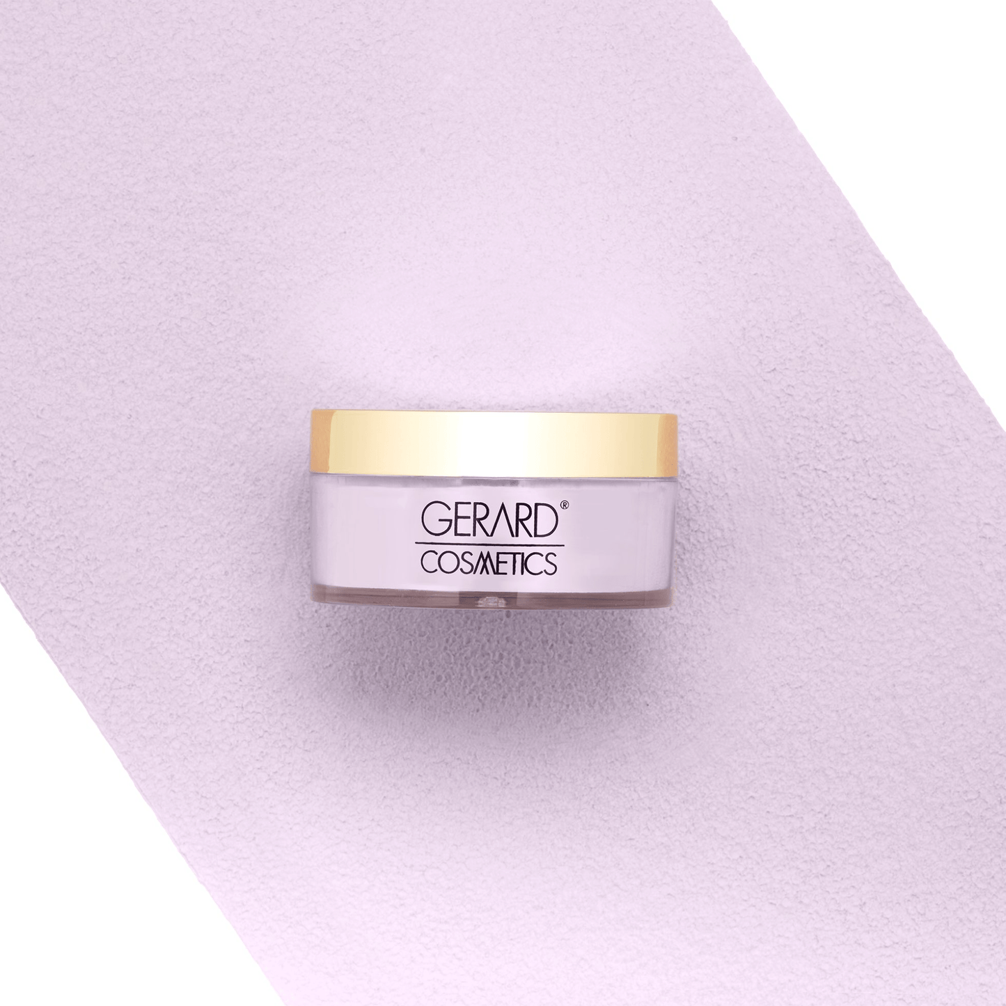 Jar of Gerard Cosmetics on a light purple background
