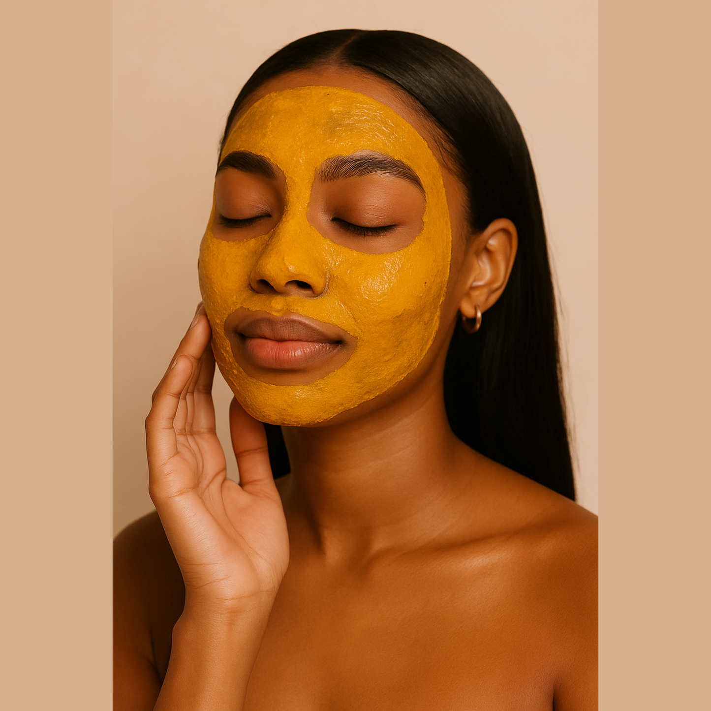Woman applying a yellow facial mask on a beige background