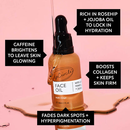 Face oil bottle with dropper on a pink background, featuring text about its benefits.