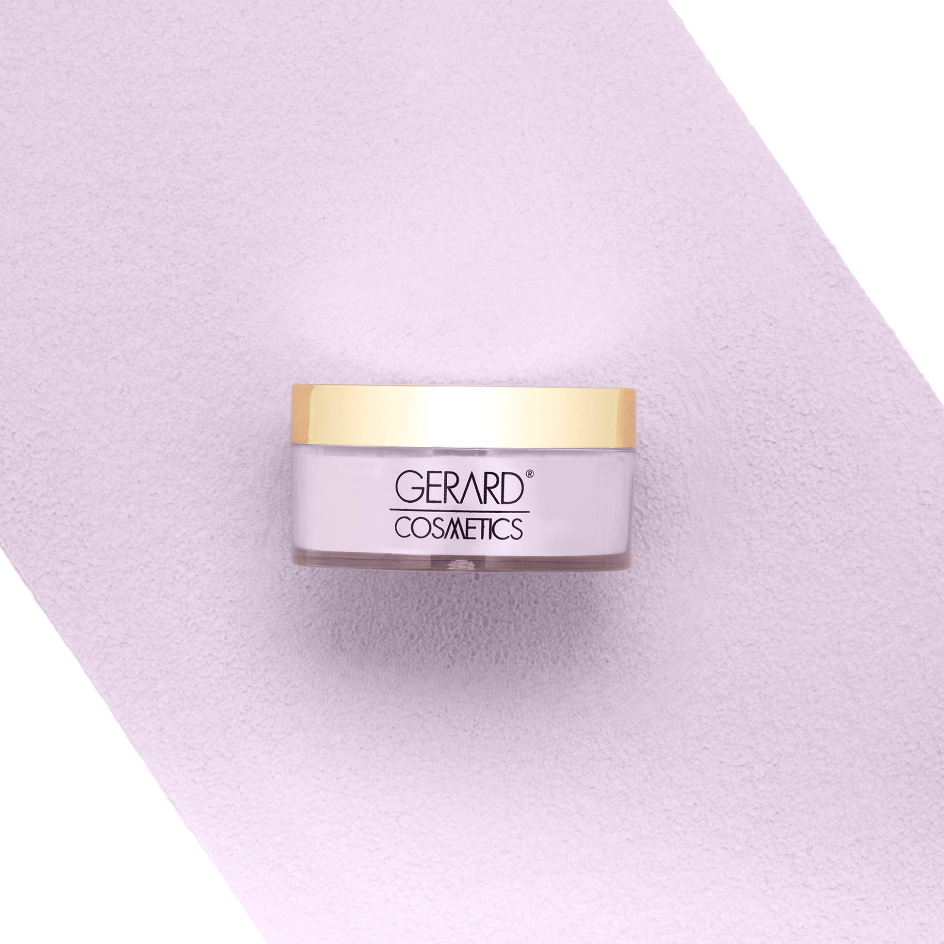 Jar of Gerard Cosmetics on a light purple background