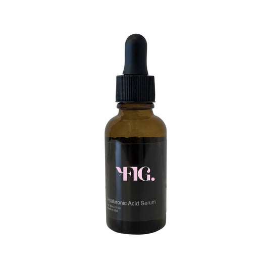 Brown glass bottle with black cap labeled 'FIG.' on a white background