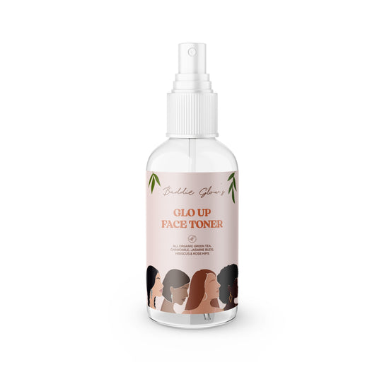 Bottle of 'Glo Up Face Toner' with a white spray nozzle on a white background