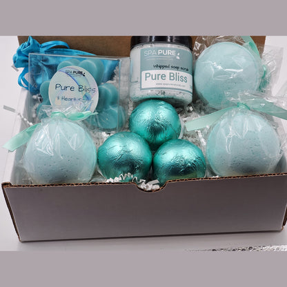 Spa Pure Luxury Spa Kit - Pure Bliss - 3 XL Pure Bliss Bath Fizzies, 3 Pure Bliss shower steamers, 3 Heart-shaped soaps, one 3.5 oz Pure Bliss whipped soap scrub, 1 Roll-on Perfume, Perfect for a mini-spa treatment.