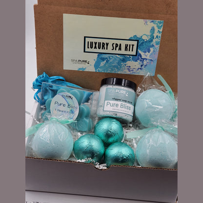 Spa Pure Luxury Spa Kit - Pure Bliss - 3 XL Pure Bliss Bath Fizzies, 3 Pure Bliss shower steamers, 3 Heart-shaped soaps, one 3.5 oz Pure Bliss whipped soap scrub, 1 Roll-on Perfume, Perfect for a mini-spa treatment.