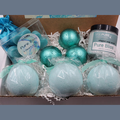 Spa Pure Luxury Spa Kit - Pure Bliss - 3 XL Pure Bliss Bath Fizzies, 3 Pure Bliss shower steamers, 3 Heart-shaped soaps, one 3.5 oz Pure Bliss whipped soap scrub, 1 Roll-on Perfume, Perfect for a mini-spa treatment.