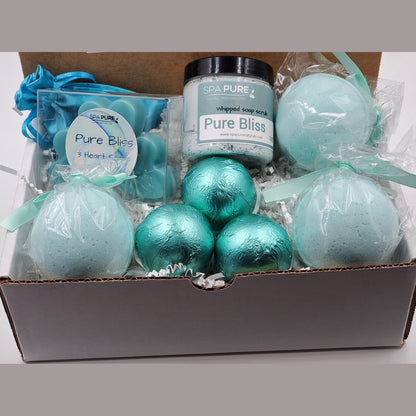 Spa Pure Luxury Spa Kit - Pure Bliss - 3 XL Pure Bliss Bath Fizzies, 3 Pure Bliss shower steamers, 3 Heart-shaped soaps, one 3.5 oz Pure Bliss whipped soap scrub, 1 Roll-on Perfume, Perfect for a mini-spa treatment.