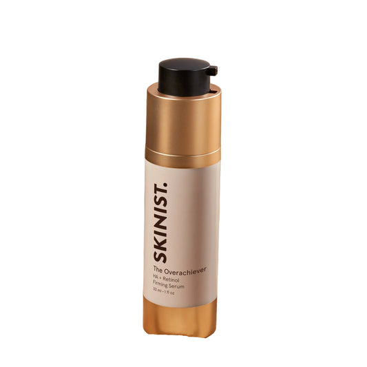 SKINIST serum bottle on a white textured background