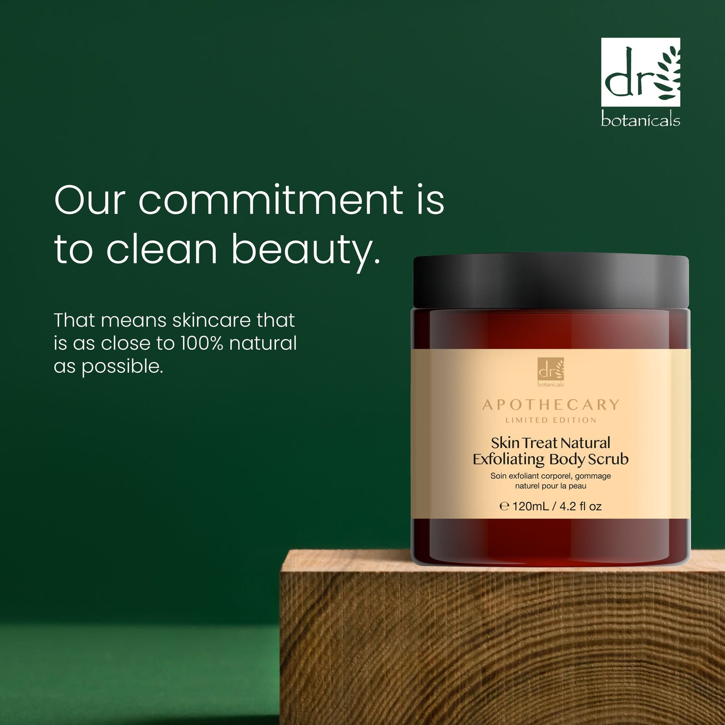 Body scrub jar with text about clean beauty on a green background