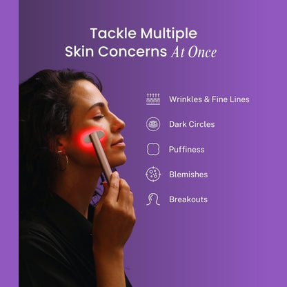 Woman using a skincare device on her face with a purple background and text about skin concerns.